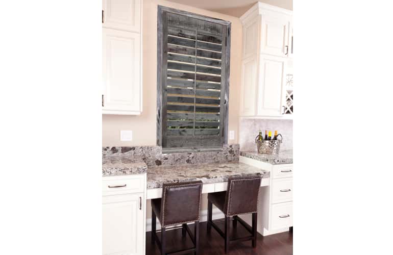 Reclaimed wood shutters on kitchen window in Cleveland